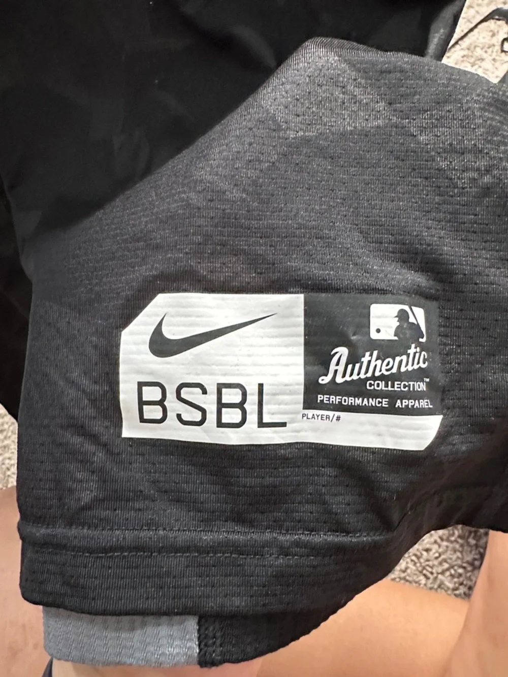 Nike Black Long-Sleeve Performance Tee with Subtle Geometric Print